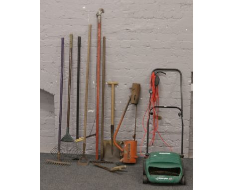 A collection of garden tools to include X300 flame gun, Qualcast lawn rakers 32, shovel, rakes etc.