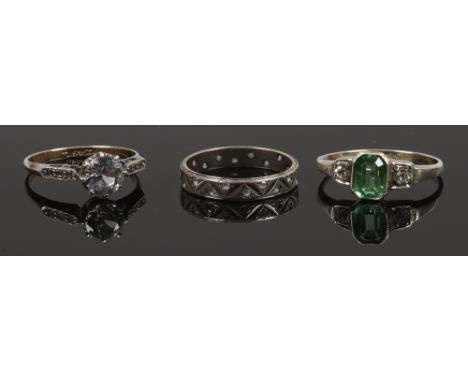Three vintage paste set rings marked for 9ct and silver.