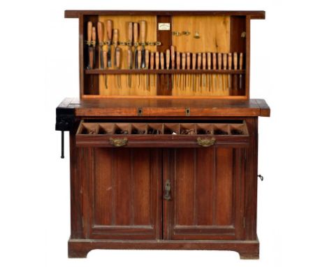 A GENTLEMAN'S MAHOGANY "COMPACTUM" TOOL CABINET BY MARPLES, C1910 with rising rack, panelled doors, drawers or a door to the 