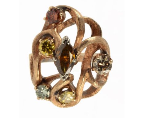 A FANCY COLOURED DIAMOND FIVE STONE ASYMMETRICAL including cinnamon and cognac diamonds, in openwork gold setting, 9.9g, size