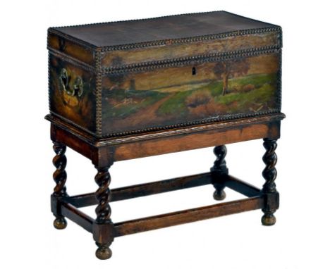 A DUTCH STYLE BRASS NAILED AND PAINTED LEATHER COVERED WOOD TRUNK, EARLY 20TH C  the lid painted with the scene of Dorothy Ve