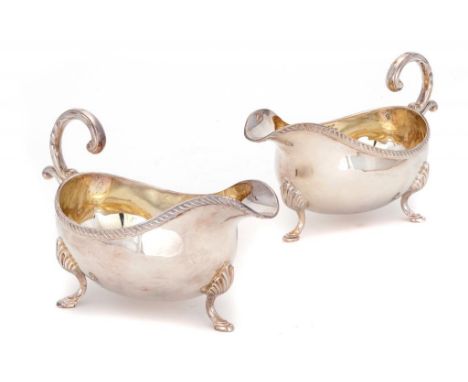 A PAIR OF ELIZABETH II SILVER GADROONED SAUCE BOATS  19cm l, maker RNP, Birmingham 1982, 31ozs ++In good condition with light