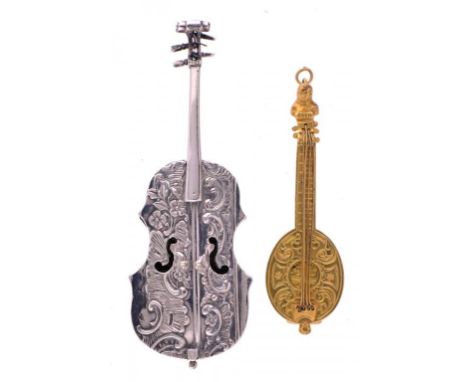 A GERMAN SILVER MINIATURE OR TOY VIOLIN  the back hinged to form a box, 9cm l, import marked by James Thredder, Son & Co, Lon