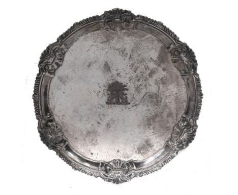 YORK SILVER.  A GEORGE III GADROONED WAITER  the rim with shells at intervals, on three feet, crested, 18cm diam, maker's and