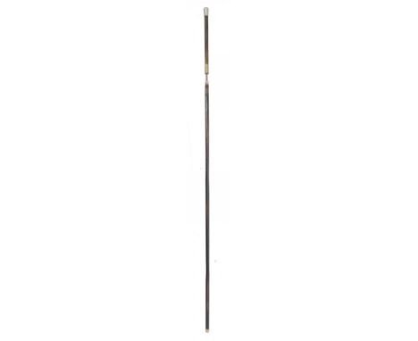 A BAMBOO SWORDSTICK, 19TH C covered in a black stain with nickel mounts and fine spear pointed steel stiletto of hexagonal se