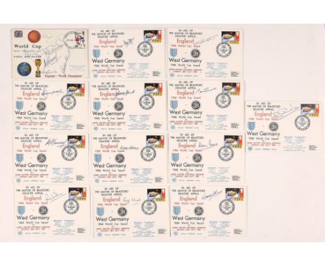 SOCCER.  WORLD CUP GREAT BRITAIN COMMEMORATIVE FIRST DAY COVER signed by Bobby and Jackie Charlton, Nobby Stiles, Sir Alf Ram