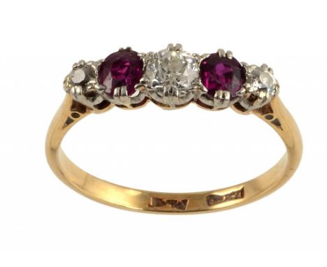 A RUBY AND DIAMOND RING,   in gold marked 18ct PLAT, 3.3g, size F ++In good second hand condition with light wear consistent 