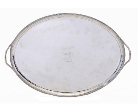 A GEORGE III SILVER TEA TRAY with reeded handles and rim, crested, 51cm w, by Elizabeth Jones, London 1790, 51ozs 10dwts ++En