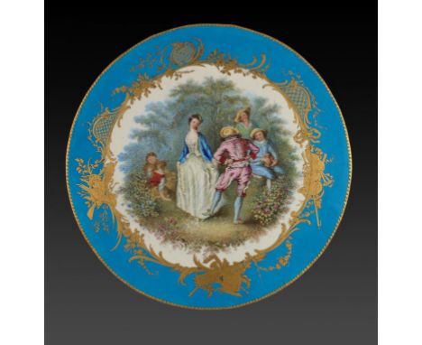 A FRENCH PORCELAIN PLAQUE IN SEVRES STYLE, LATE 19TH C painted with Wattauesque dancers in ciselé border reserved on a bleu c