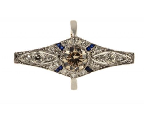 AN ART DECO DIAMOND AND SAPPHIRE RING, C1930 with a larger central cognac diamond, gold hoop marked 18CT PLAT, stamped invent