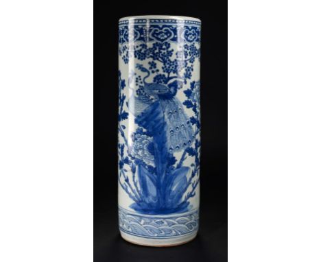 A CHINESE BLUE AND WHITE STICK STAND, 19TH C painted with peafowl and peony, flowers and rockwork to the reverse, the base un