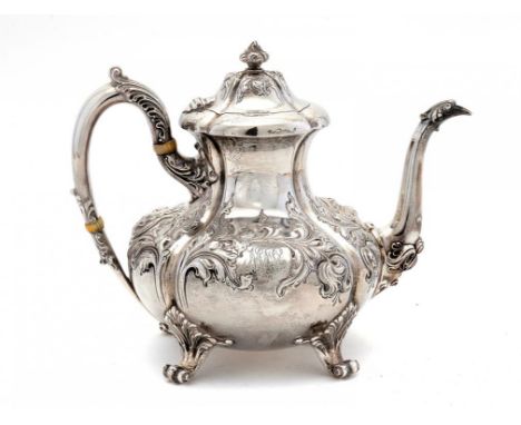 A NORTH AMERICAN SILVER MELON SHAPED TEAPOT, LATE 19TH C embossed with flowers, 19.5cm h, by Theodore B Starr of New York, ma