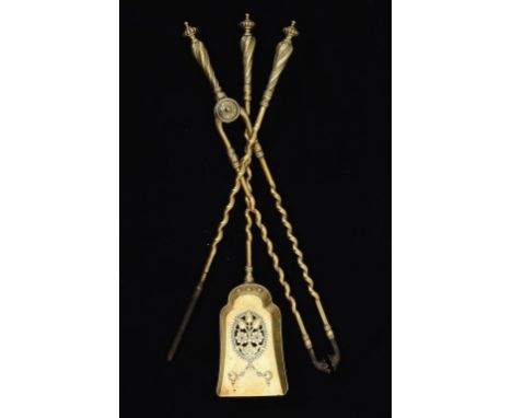 A SET OF THREE VICTORIAN BRASS SPIRAL FIRE IRONS, C1880  58 and 61cm l, stamped PODR mark for 1881 ++In good condition with l