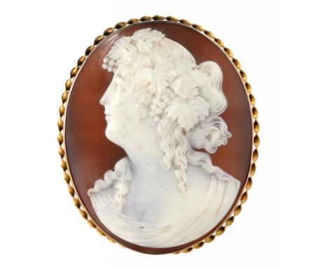 A CAMEO BROOCH, LATE 19TH C  the shell carved with the head of a bacchante, 5.7cm h ++In fine condition with light scratches 