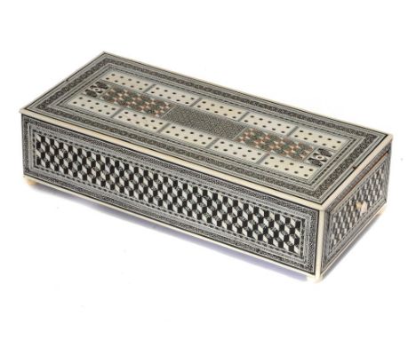 AN INDIAN IVORY,  EBONY, SANDALWOOD AND SADELI CRIBBAGE BOX, MID 19TH C  with double ended drawer, on ivory feet, 28.5cm w an