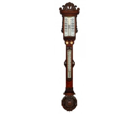 A VICTORIAN CARVED OAK CISTERN BAROMETER J GARGORY, BIRMINGHAM, C1870 with white glass registers and twin verniers, two origi