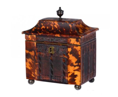 A REGENCY PRESSED TORTOISESHELL TEA CADDY, C1820  of pagoda   form, the sides   with arched windows,   balustrading and colum