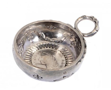 A FRENCH SILVER WINE TASTER  the bowl stamped with the initial M and engraved with   AUDIGE, chased with   husk swags and ins