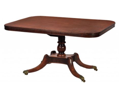 AN EARLY VICTORIAN MAHOGANY BREAKFAST TABLE, C1840 with crossbanded top on turned pillar and reeded platform, swept legs and 