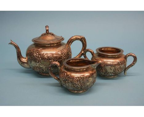 A Chinese silver three piece tea set, stamped 90, weight 1215.7 grams/39 oz