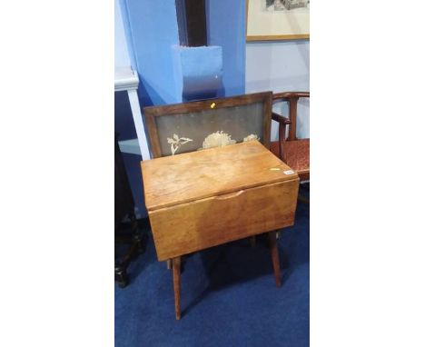 A fire screen and an oak sewing box
