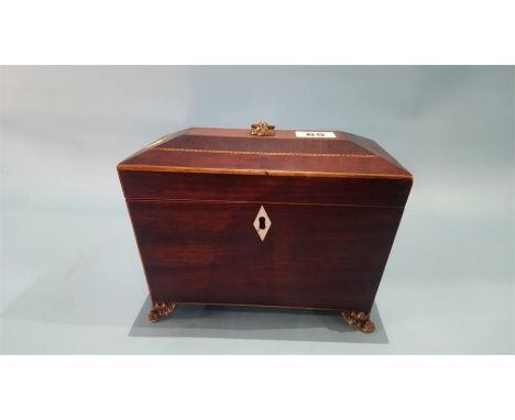 A Georgian mahogany sarcophagus shaped tea caddy.