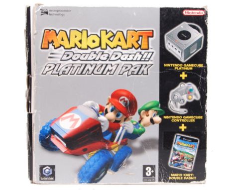 A Nintendo Gamecube limited edition ' Mario Kart Double Dash Platinum Pak ' games console. Appears complete and unused (many 