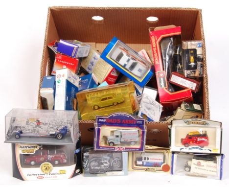 A large collection of approx 30x boxed diecast model cars and vehicles. To include; Lledo Days Gone, Matchbox Collectibles, C