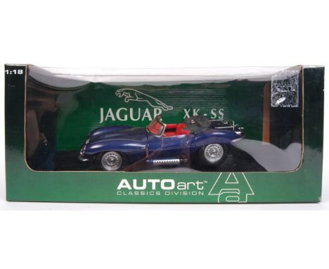 A 1:18 scale Auto Art Classic Division diecast model Jaguar XK - SS. Vehicle appear mint, within the original box.&nbsp;