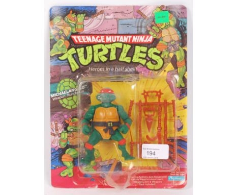 An original vintage Playmates made Teenage Mutant Ninja Turtles carded first issue 10 back action figure of ' Michaelangelo .