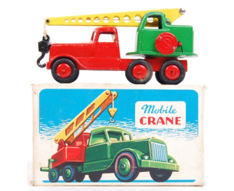 An original vintage Crescent Toys diecast model No. 1269 ' Mobile Crane '. Appears near mint, within the original box. Orange