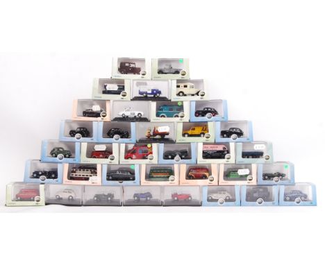 A large collection of 35x assorted small scale (mostly 1:76) Oxford diecast model cars and vehicles. All appear mint, and unu