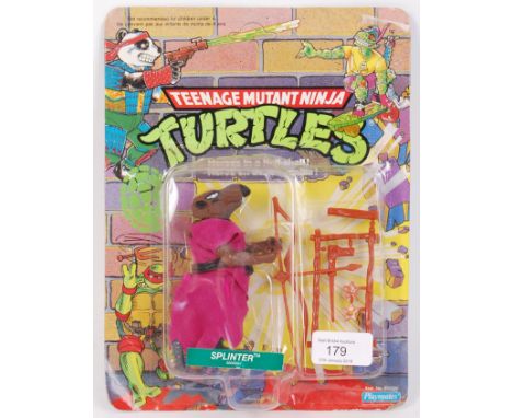 An original vintage Playmates made Teenage Mutant Ninja Turtles carded 44 back action figure of ' Splinter .' Unpunched card 