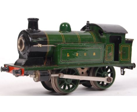 An original vintage Marklin made T3130 0 gauge tinplate electric trainset locomotive. LNER livery, in green and black. With M