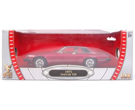 A 1:18 scale Yat Ming Road Signature Collection diecast model 1975 Jaguar XJS. Vehicle appear mint, within the original box.&