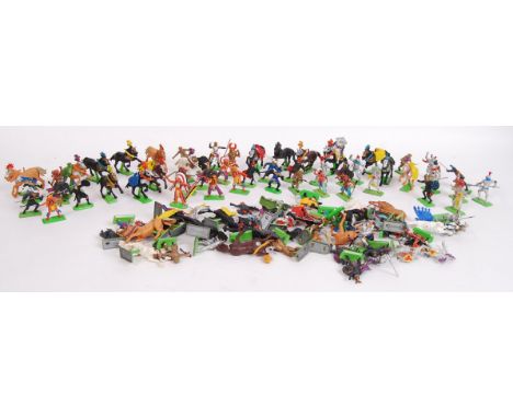 A large collection of assorted vintage Britains Deetail plastic model figures on diecast metal bases. Most Knights / Medieval