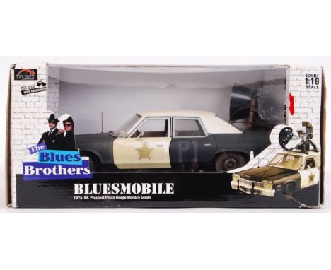 A great ERTL Joyride 1:18 scale diecast model 1974 Dodge Monaco Sedan ' Bluesmobile ' diecast model from The Blues Brothers m