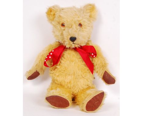 A charming vintage 1950's Chiltern made teddy bear. Golden mohair, with plastic eyes, leather pads. All original condition. C