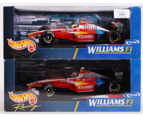 Two Hot Wheels made precision diecast 1:18 scale model Formula One / F1 racing cars - both from the Williams F1 Team series -