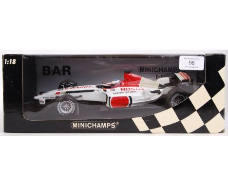 A Minichamps made precision diecast 1:18 scale model Formula One / F1 racing car ' B-A-R Honda 005, Jensen Button .' Ex-shop-