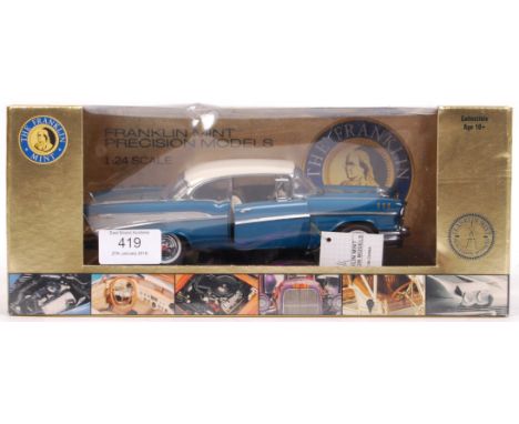 A good Franklin Mint made precision diecast 1:24 scale model 1957 Chevrolet Bel Air. Appears mint and unused, within the orig