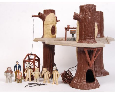 An original vintage Palitoy / Kenner made Star Wars action figure playset ' Ewok Village .' Unboxed. Comes with an assortment
