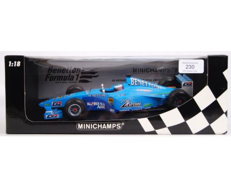 A Minichamps made precision diecast 1:18 scale model Formula One / F1 racing car ' Benetton Playlife B200, Jenson Button 1st 