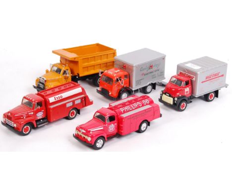 A collection of 5x American made First Gear 1:34 scale precision diecast model trucks. All haulage related, to include; West 