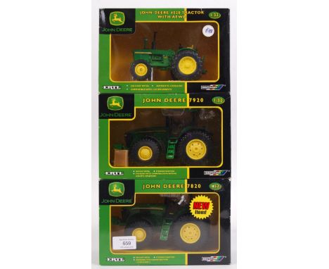 A collection of 3x ERTL Britains 1:32 scale diecast model John Deere Farm Tractors. All appear mint and unused, within the or