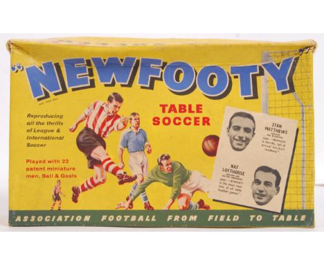 A rare vintage ' Newfooty ' Subbuteo style table top early football game. Appears complete with all 22 players, ball and goal