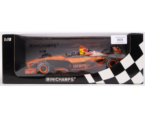 A Minichamps made precision diecast 1:18 scale model Formula One / F1 racing car ' Orangearrows A23 H-H Frentzen .' Ex-shop-s