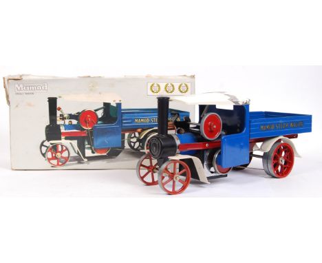 An original vintage Mamod made Live Steam ' Steam Wagon ' SW1. With turning rod, and a selection of new belts, within the ori