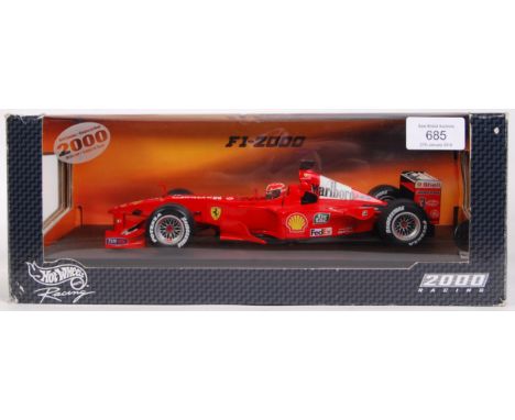 A Hot Wheels made precision diecast 1:18 scale model Formula One / F1 racing car ' F1-2000 Michael Schumacher .' Ex-shop-stoc