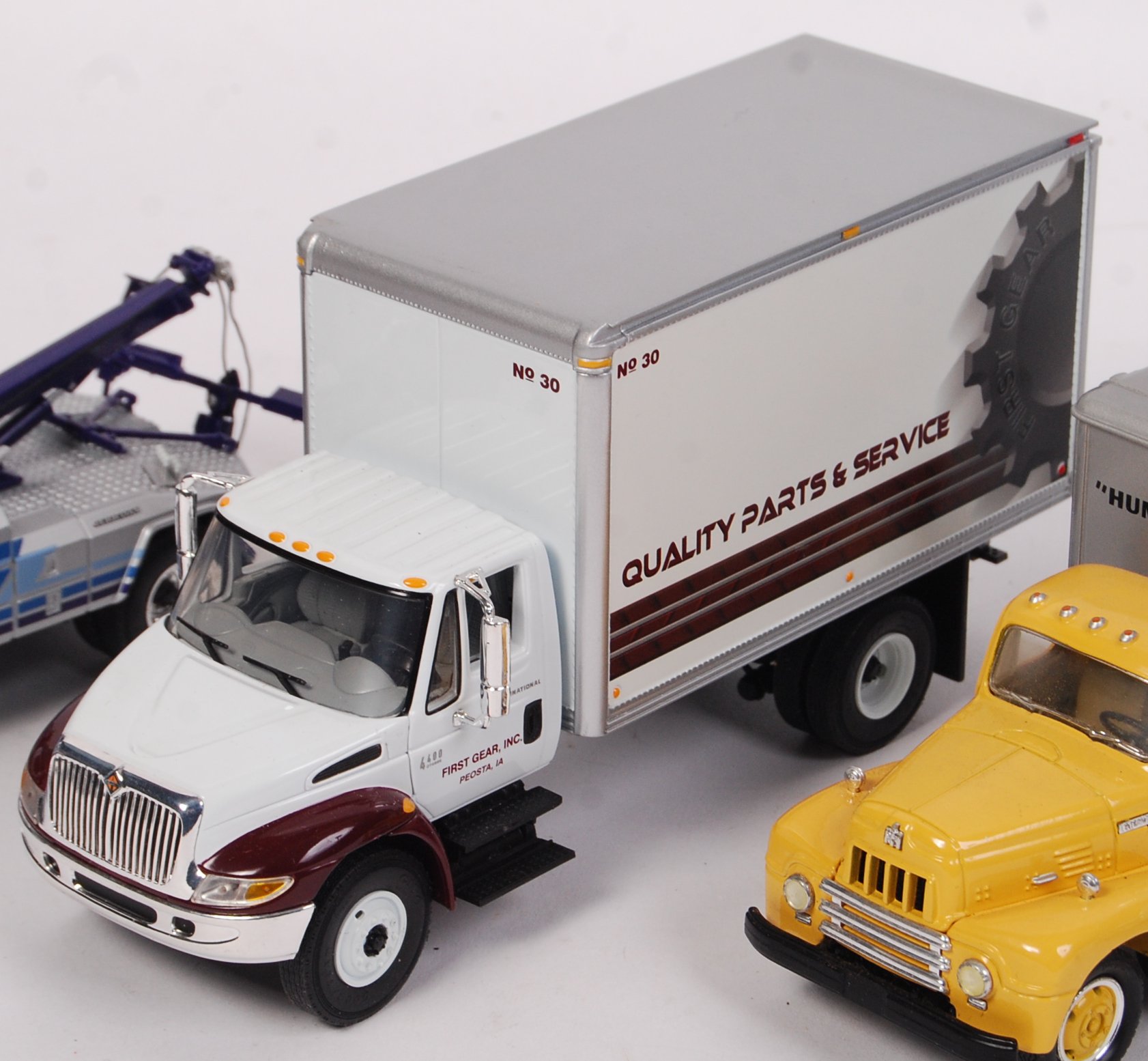 A collection of 5x American made First Gear 134 scale precision